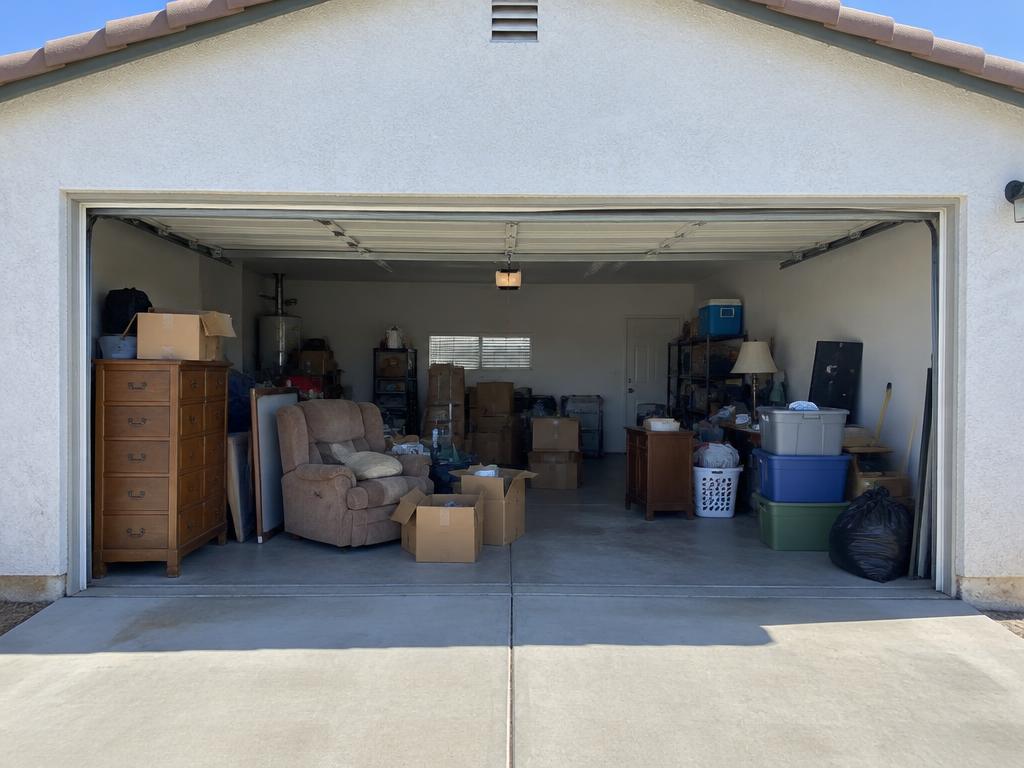 Illustrative example of a garage filled with household junk